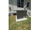 Exterior view of a new Lennox HVAC unit on a concrete slab, with grass and house siding in the background at 708 Keeling St, Brooksville, FL 34601