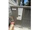 Close up showing the model and serial number label of the new Lennox HVAC at 708 Keeling St, Brooksville, FL 34601