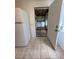 The laundry room is connected to the kitchen and features a washer and dryer at 708 Keeling St, Brooksville, FL 34601
