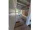 Enclosed back patio leading to the yard, offering extra space and fresh air at 708 Keeling St, Brooksville, FL 34601