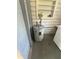 Hot water heater in utility area next to the laundry machines at 708 Keeling St, Brooksville, FL 34601