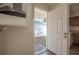 Backyard access from the kitchen with a partial view of the yard, showing the fence at 725 2Nd Ne Ave, Largo, FL 33770