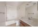 Bathroom with a shower-tub combo, ceramic tile floors, toilet, sink, and vanity at 725 2Nd Ne Ave, Largo, FL 33770