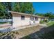 A cozy single-story residence showcases a simple design and functional outdoor space at 725 2Nd Ne Ave, Largo, FL 33770
