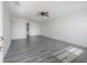 Bright living room with sleek gray floors and ample natural light at 725 2Nd Ne Ave, Largo, FL 33770