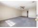 Bright living room featuring neutral walls and carpet at 725 2Nd Ne Ave, Largo, FL 33770
