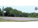 This image displays a full basketball court ready for a friendly neighborhood game at 8260 32Nd N Ave, St Petersburg, FL 33710