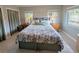 Comfortable bedroom showcasing natural light, neutral tones, and ample storage space at 8260 32Nd N Ave, St Petersburg, FL 33710