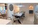 Spacious dining area features a modern table and decor with a chandelier at 8260 32Nd N Ave, St Petersburg, FL 33710