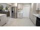 Updated kitchen featuring a stainless-steel refrigerator and sleek cabinets at 8260 32Nd N Ave, St Petersburg, FL 33710