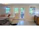 Bright and airy living room with a view of the outdoor patio at 8260 32Nd N Ave, St Petersburg, FL 33710
