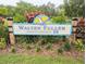An inviting Walter Fuller park sign surrounded by well-maintained landscaping, perfect for community enjoyment at 8260 32Nd N Ave, St Petersburg, FL 33710