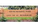 A wooden sign indicates you have arrived at Abercrombie Park in St. Petersburg, Florida at 8260 32Nd N Ave, St Petersburg, FL 33710