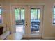 View of patio and dining area through open doors, extending indoor living space at 8260 32Nd N Ave, St Petersburg, FL 33710