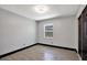 Bright bedroom with gray walls, modern flooring and a window for natural light at 8603 N 9Th St, Tampa, FL 33604