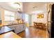Spacious eat-in kitchen with access to the dining area at 9020 Gray Fox Ln, Port Richey, FL 34668