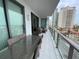 Spacious balcony featuring seating and views of the city skyline at 100 1St N Ave # 702, St Petersburg, FL 33701