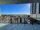 Balcony with ocean view, city buildings, and blue sky, showcasing the scenery at 100 1St N Ave # 702, St Petersburg, FL 33701