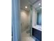 Half bathroom featuring modern fixtures, vanity, and toilet at 100 1St N Ave # 702, St Petersburg, FL 33701