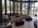 Spacious common area with floor to ceiling windows and comfortable modern furnishings at 100 1St N Ave # 702, St Petersburg, FL 33701
