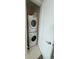 Convenient laundry room with stacked washer and dryer for efficient use of space at 100 1St N Ave # 702, St Petersburg, FL 33701