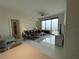 Bright living room with seating, ocean view, and open floor plan at 100 1St N Ave # 702, St Petersburg, FL 33701