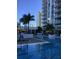 Inviting pool area featuring resort-style amenities and nearby high-rise condos at 100 1St N Ave # 702, St Petersburg, FL 33701