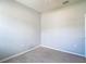 This empty bedroom features neutral walls, carpet, trim, and plenty of natural light at 1022 Montgomery Bell Rd, Wesley Chapel, FL 33543