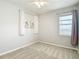 Simple bedroom with one window and decor at 1022 Montgomery Bell Rd, Wesley Chapel, FL 33543