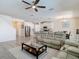 Open-concept living space connects the living room, dining area, and kitchen at 1022 Montgomery Bell Rd, Wesley Chapel, FL 33543