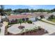 Inviting single-Gathering home with a manicured front yard, spacious driveway, and a charming brick exterior at 10400 112Th Way, Largo, FL 33778