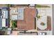 Aerial view of the home with a brown roof, landscaping, and backyard patio at 10400 112Th Way, Largo, FL 33778