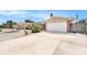 Single-story home with brick accents, well-kept landscaping, and a spacious concrete driveway at 10400 112Th Way, Largo, FL 33778