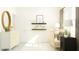 Bright Bedroom with crib, shelving, dresser, and natural light at 10812 Keato Beach Ct, Tampa, FL 33647