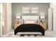 Comfortable bedroom featuring a cozy bed, side tables, and stylish decor at 10812 Keato Beach Ct, Tampa, FL 33647