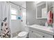 Bright bathroom with a shower-over-tub, white subway tile, modern fixtures, and a clean, functional layout at 11348 59Th Ter, Seminole, FL 33772