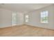 Bright bedroom features hardwood floors, three windows and ensuite bathroom at 116 24Th S Ave, St Petersburg, FL 33705