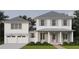 Charming two-story home with white siding, gray roof and shutters, and a welcoming front porch at 116 24Th S Ave, St Petersburg, FL 33705