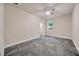 Bedroom with plush carpeting, neutral walls, and a ceiling fan at 1229 Hillandale Reserve Dr, Tampa, FL 33613
