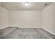 Large bonus room with neutral carpeting and ample space for activities at 1229 Hillandale Reserve Dr, Tampa, FL 33613