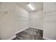 Spacious walk-in closet with carpet flooring and ample storage space on white wire shelving at 1229 Hillandale Reserve Dr, Tampa, FL 33613