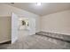 Empty flex space with neutral carpet, ready for customization, and open to adjacent room at 1229 Hillandale Reserve Dr, Tampa, FL 33613