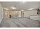 Bright upstairs living room with dark railings, and snack bar, perfect for entertaining at 1229 Hillandale Reserve Dr, Tampa, FL 33613