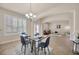 Bright, open-concept living area includes dining, foyer, and sitting areas with neutral decor at 1229 Hillandale Reserve Dr, Tampa, FL 33613