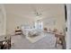 Spacious main bedroom features a ceiling fan, soft carpet, and is well-lit by lots of natural light at 1229 Hillandale Reserve Dr, Tampa, FL 33613