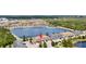 Aerial view showcasing this townhome community's location on a large lake at 12353 Bayou Flats Ln, Tampa, FL 33635