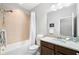 Bright bathroom featuring a shower/tub combo and neutral paint scheme at 12353 Bayou Flats Ln, Tampa, FL 33635