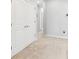 Bright bedroom area with carpet, neutral paint, and a closet at 12353 Bayou Flats Ln, Tampa, FL 33635
