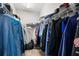 Spacious walk-in closet with ample storage and organizational system at 12353 Bayou Flats Ln, Tampa, FL 33635