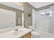 Clean bathroom featuring a shower-tub combo with white tiles and a vanity at 12925 Fieldmoor Ct, Riverview, FL 33579
